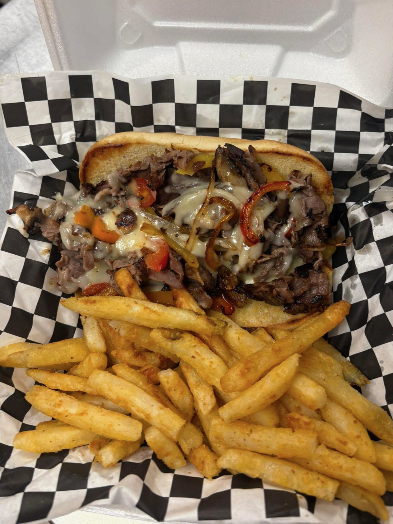 Philly cheesesteak with fries